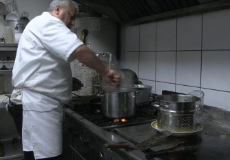Peter Ureta cooking up some habanero sauce